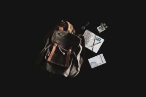 Booking.com Refund Survival Guide: How to Get Your Money Back 8 Traveler searching for hotel deals on a laptop